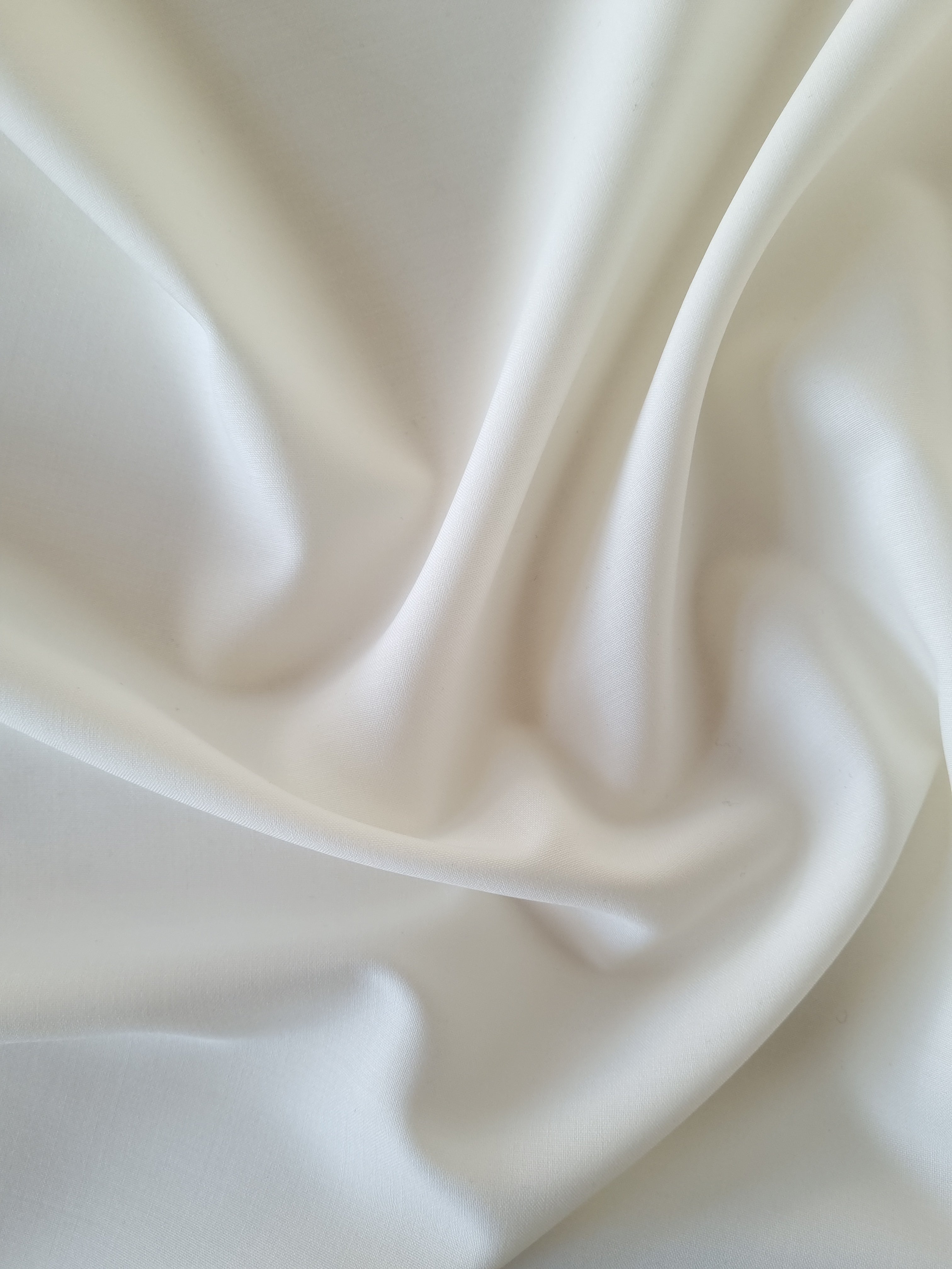 Minimalist Merino wool collared women's shirt with back split