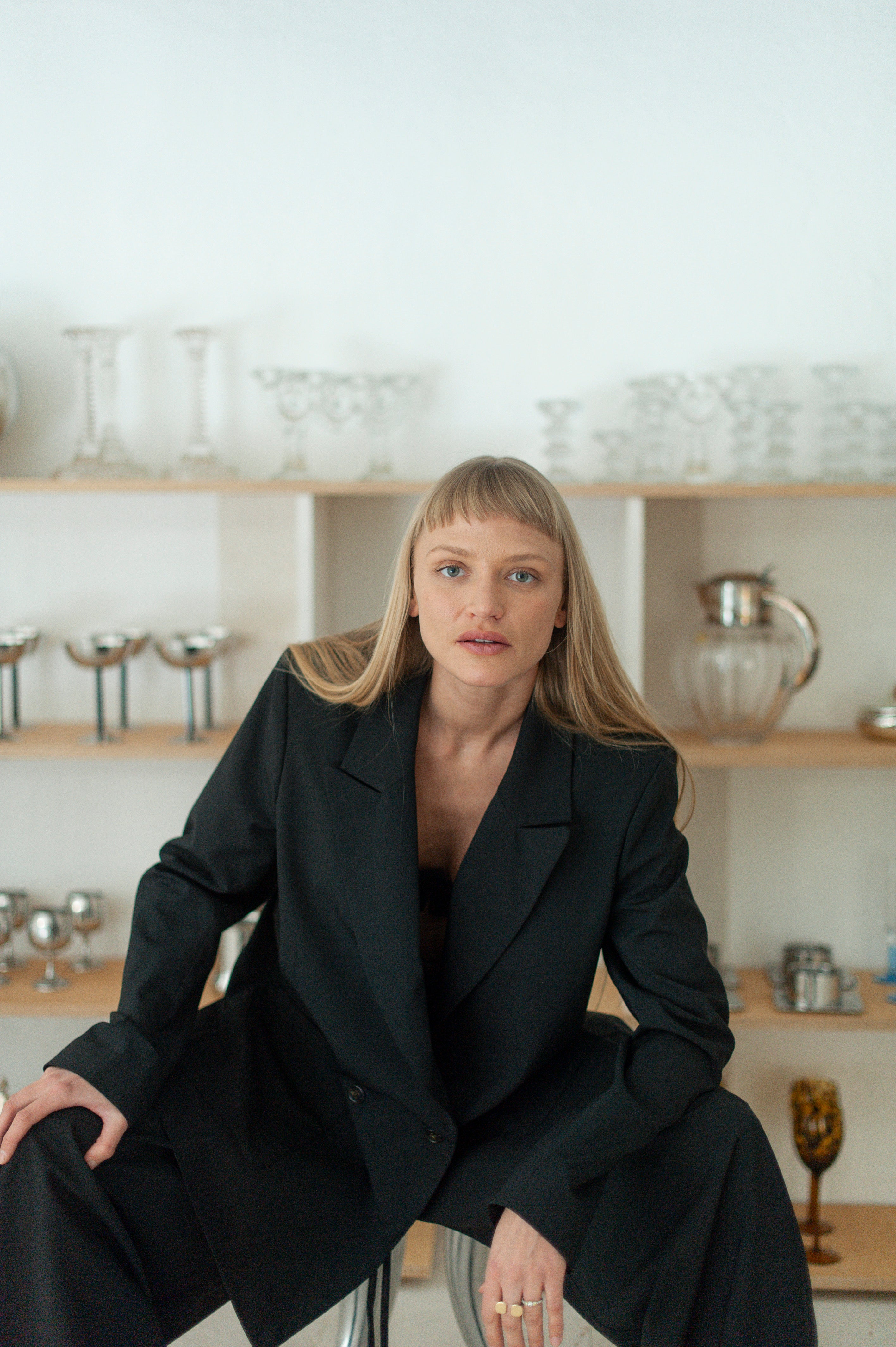 Double-breasted wool blazer styled with wide-leg pants, minimalist outfit
