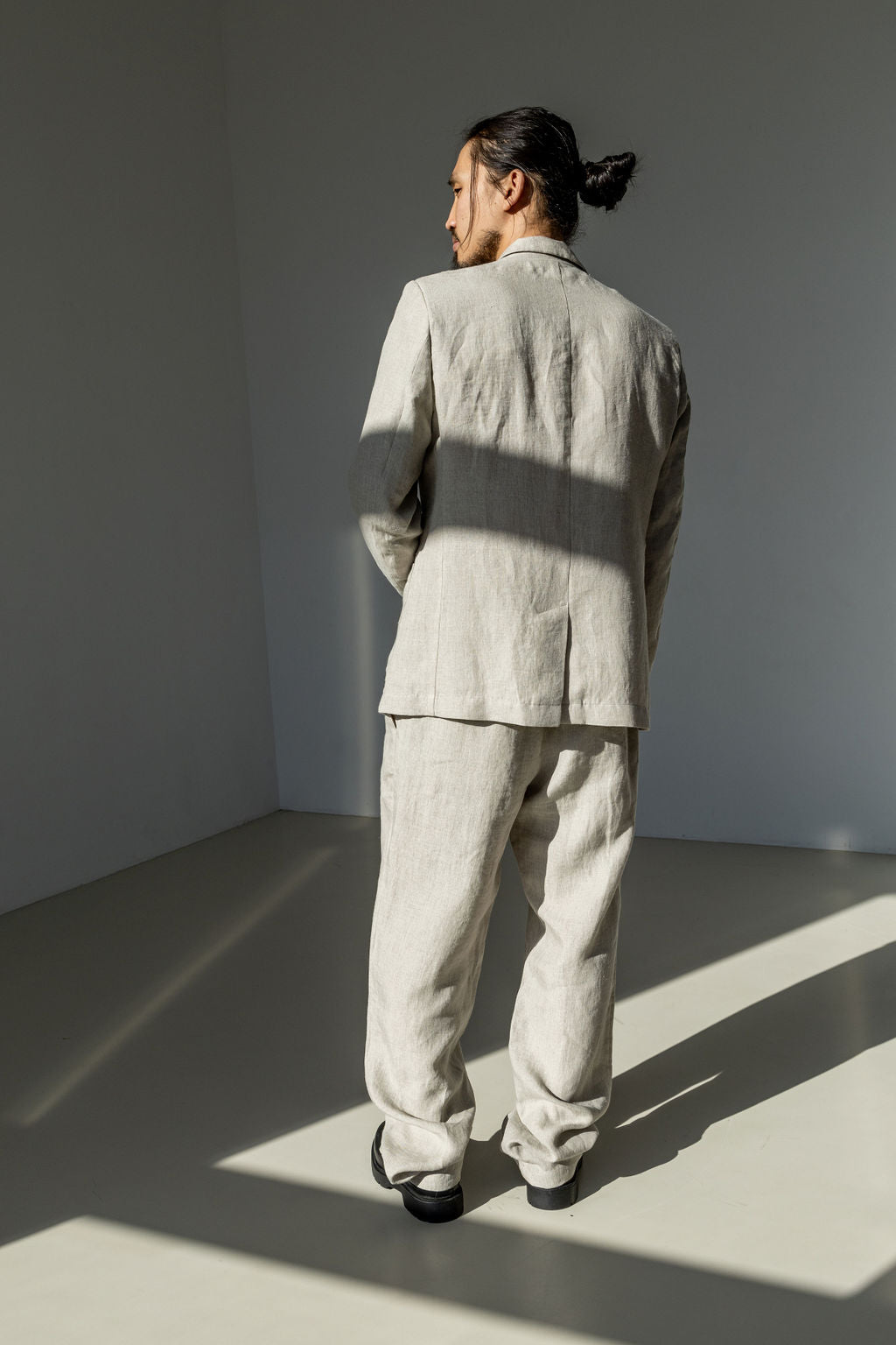 Natural linen suit from the back.
