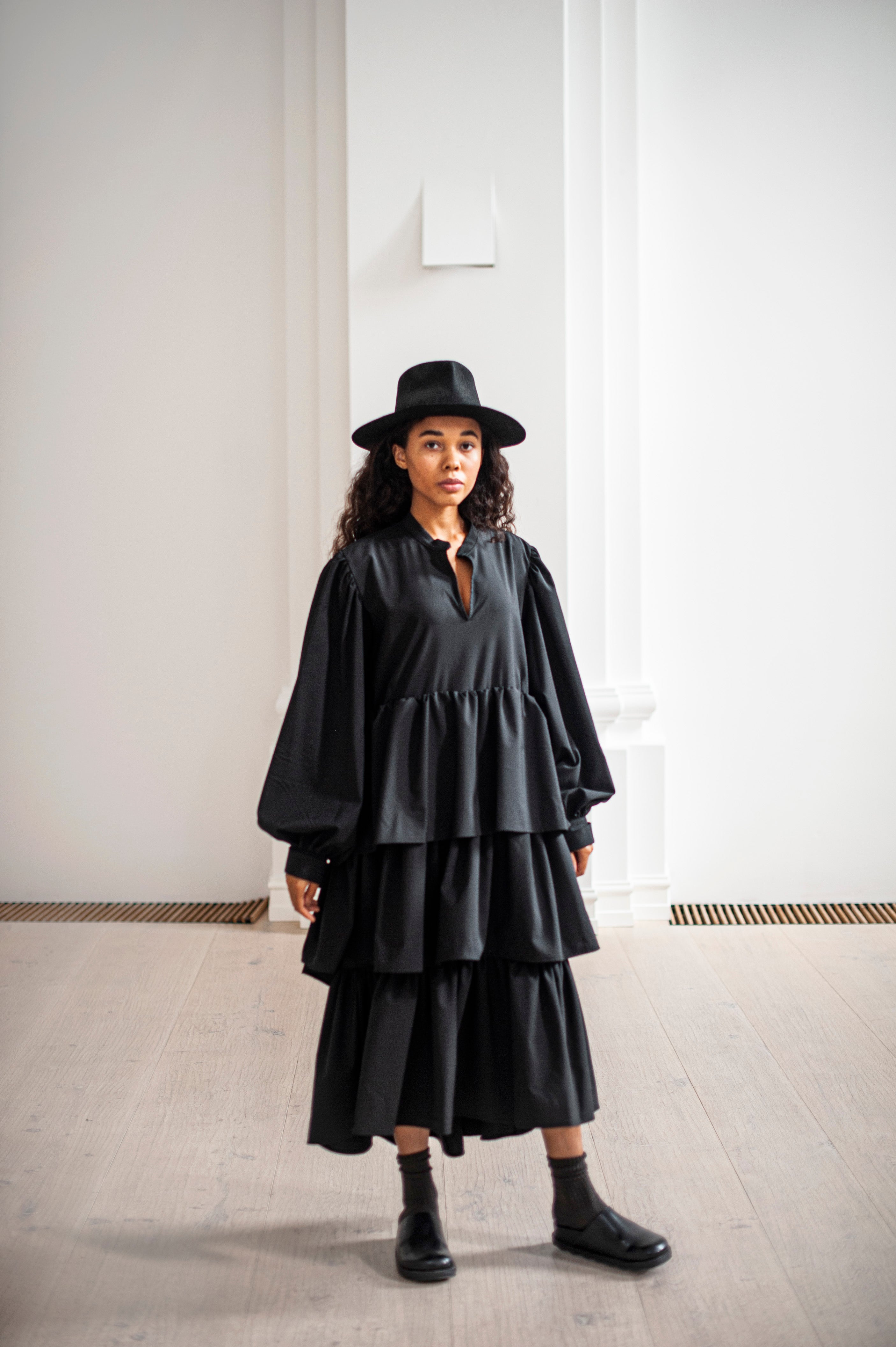 A-line tiered dress with wide sleeve. Crafted from high-quality Merino wool.