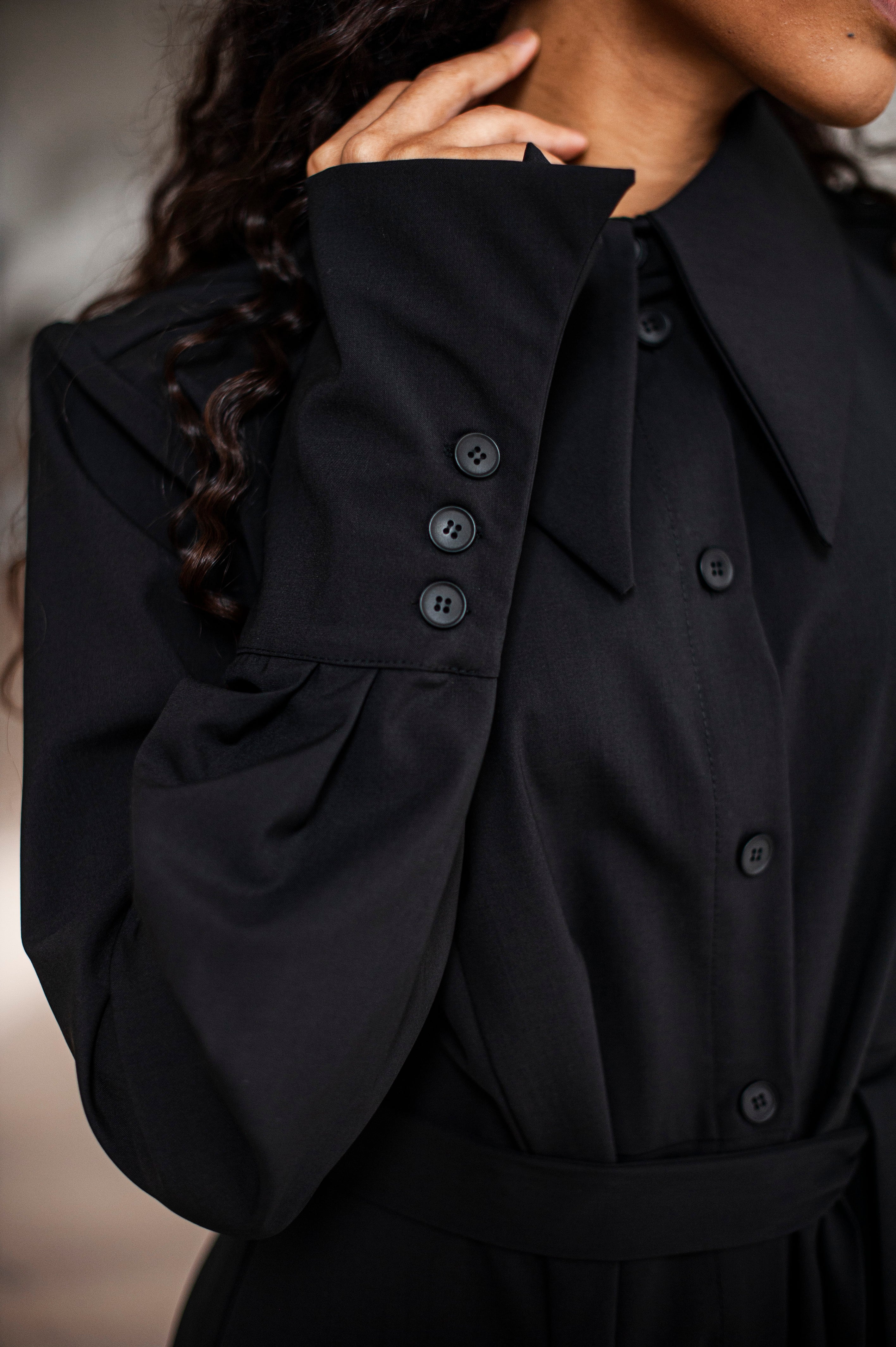 Flowy A-line dress with elegant French cuffs boasting three buttons. Subtle style for your every special outing.
