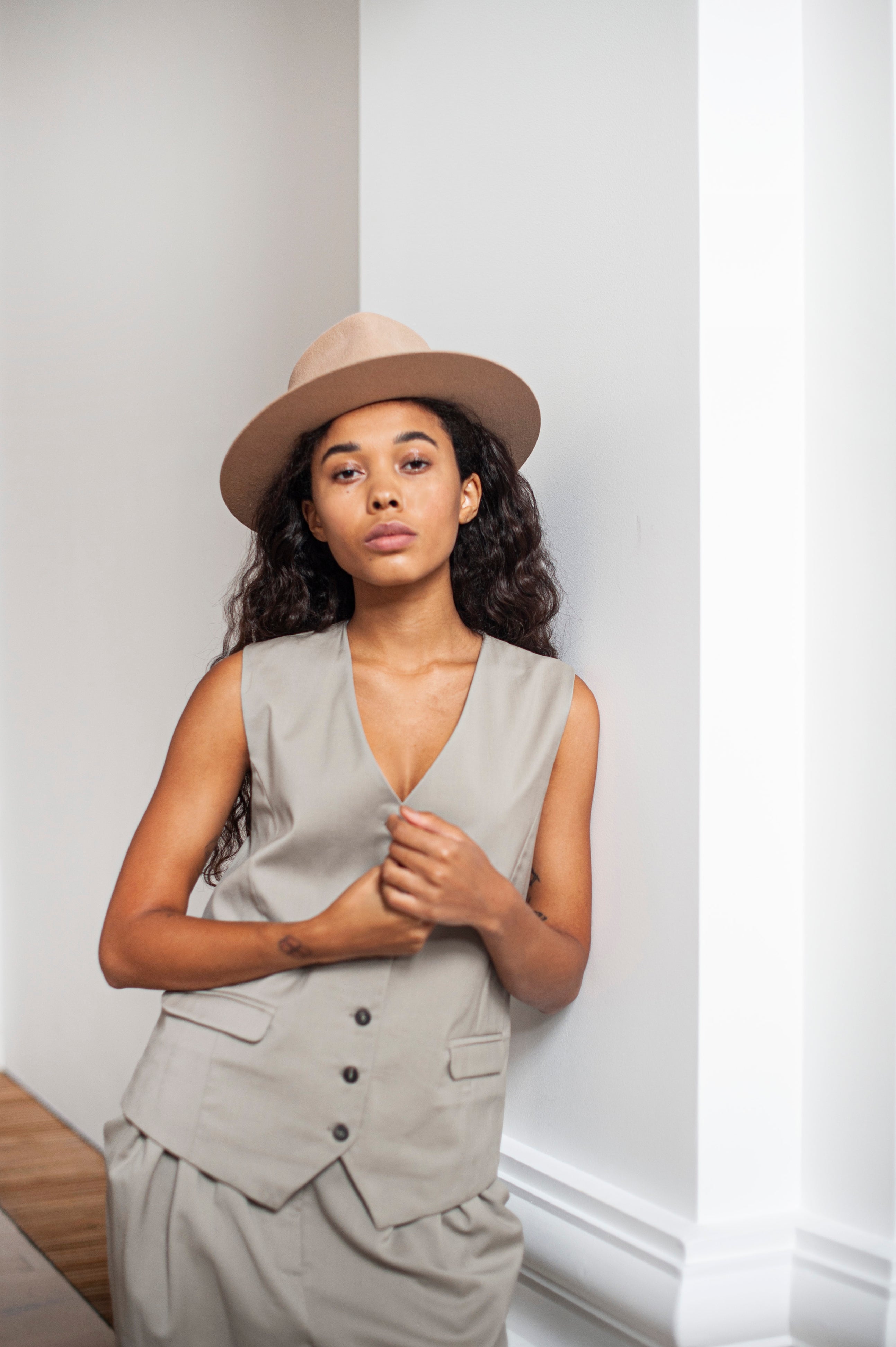 Green beige Merino wool waistcoat with a lining.