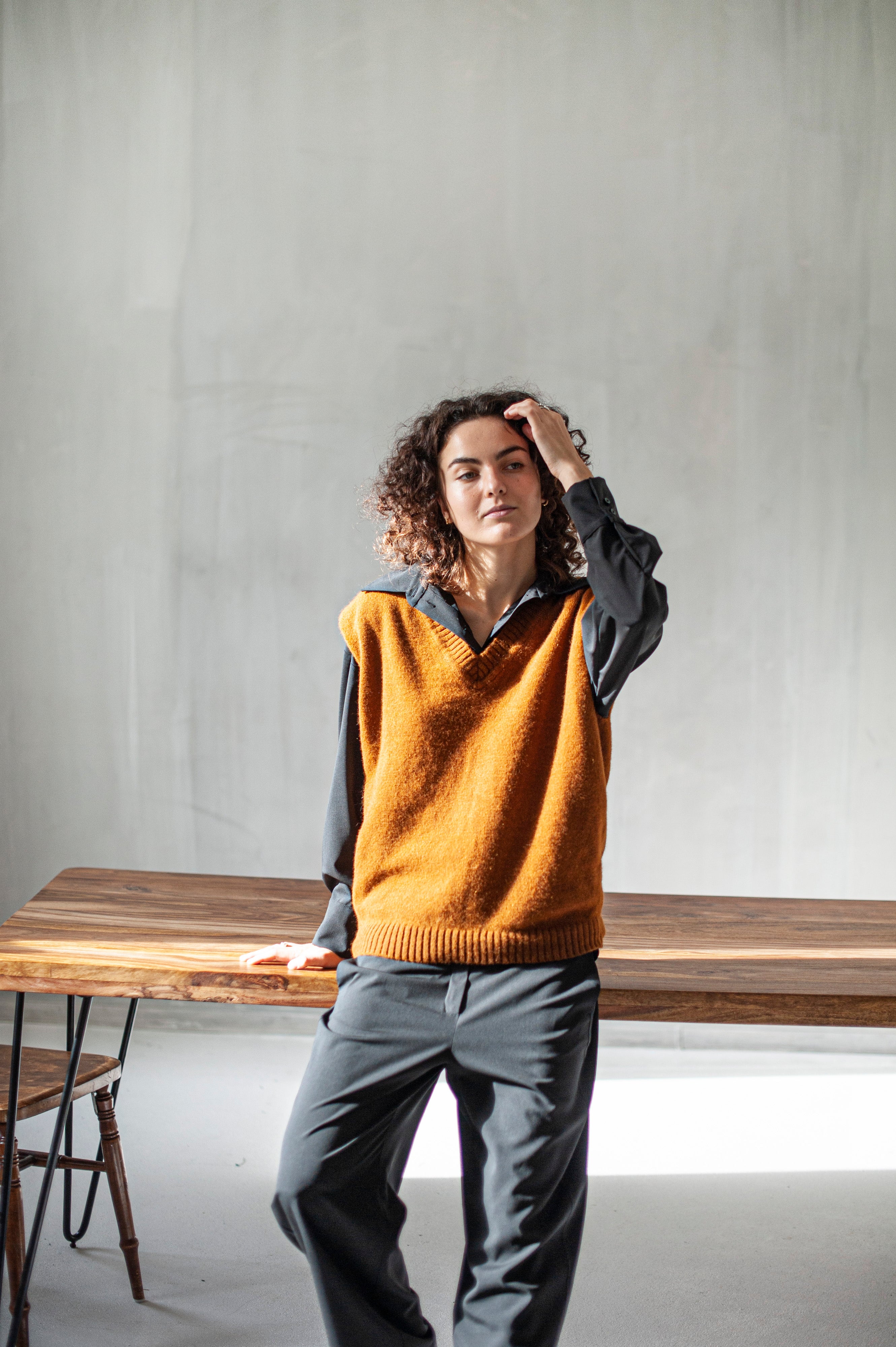 Women's relaxed fit Merino wool sleeveless sweater with a V neckline