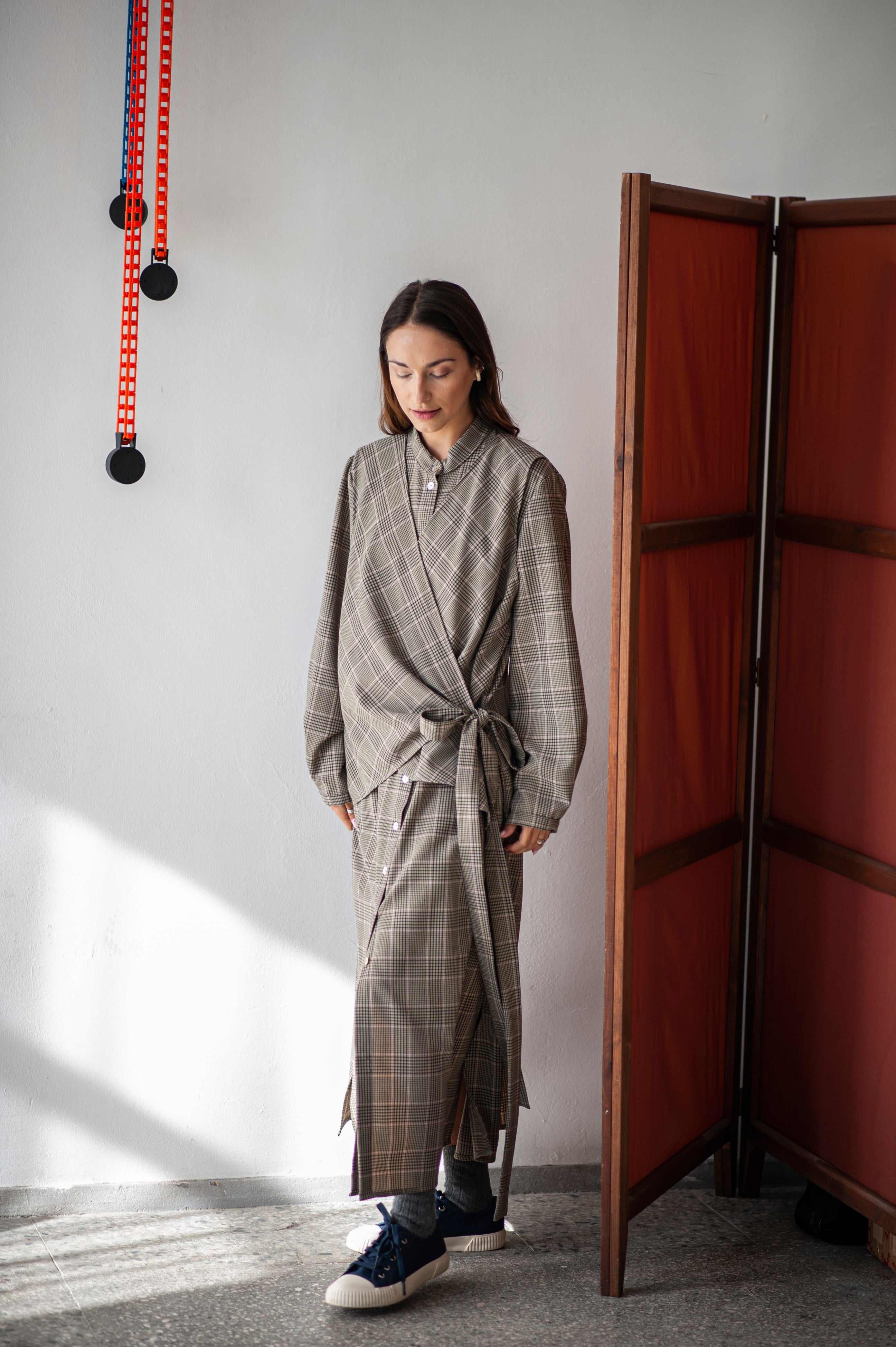 Functional and elegant A-line dress with a wrap vest detail in the front. A go-to for different occasions no matter the season.