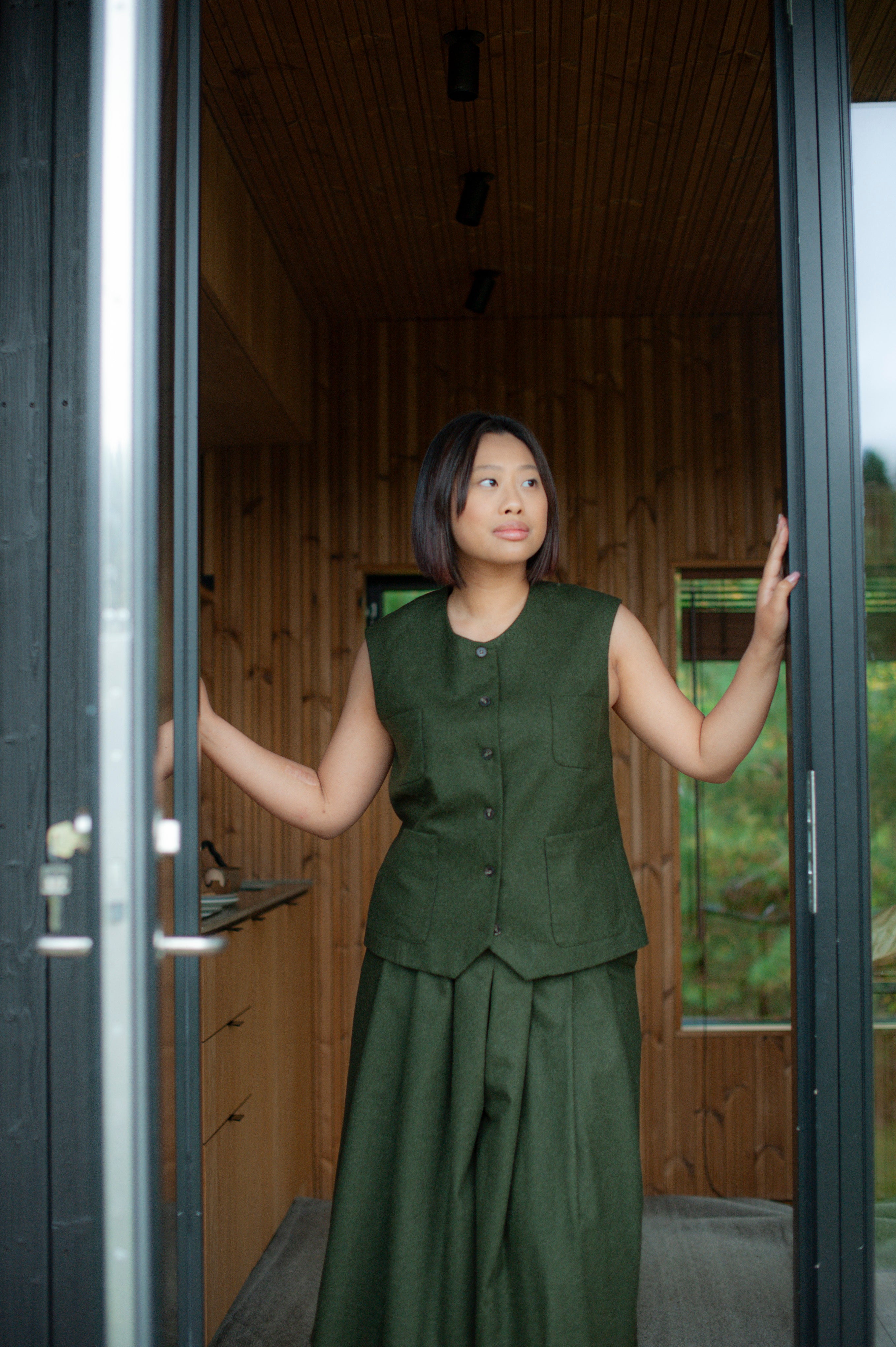 Casual yet luxurious wool vest with button closure and patch pockets.