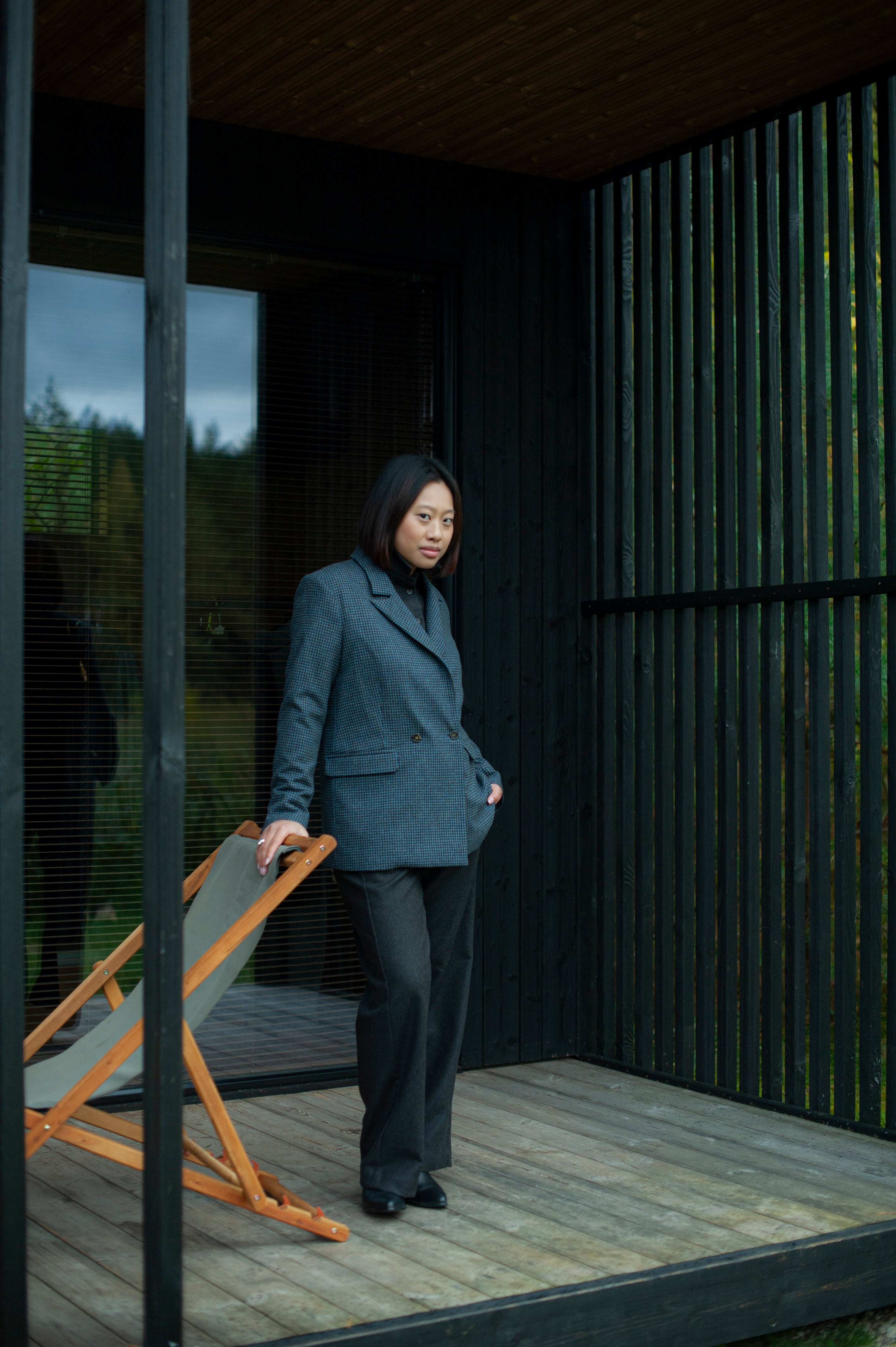 Elegant contemporary regular fit blue checked wool blazer with a double-breasted closure. Fully lined, lightweight, and cozy, it is a perfect go-to for an elevated office outfit or any other formal occasions when you need to look put-together.