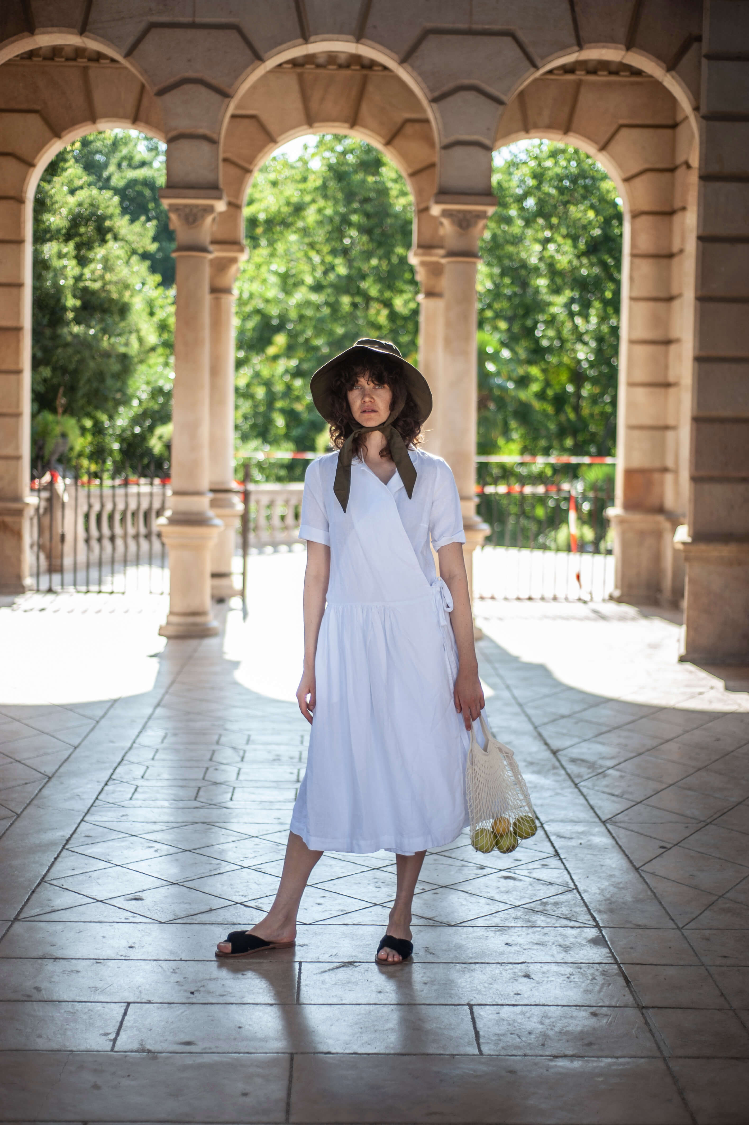Medium length linen wrap dress with a gathered waistline