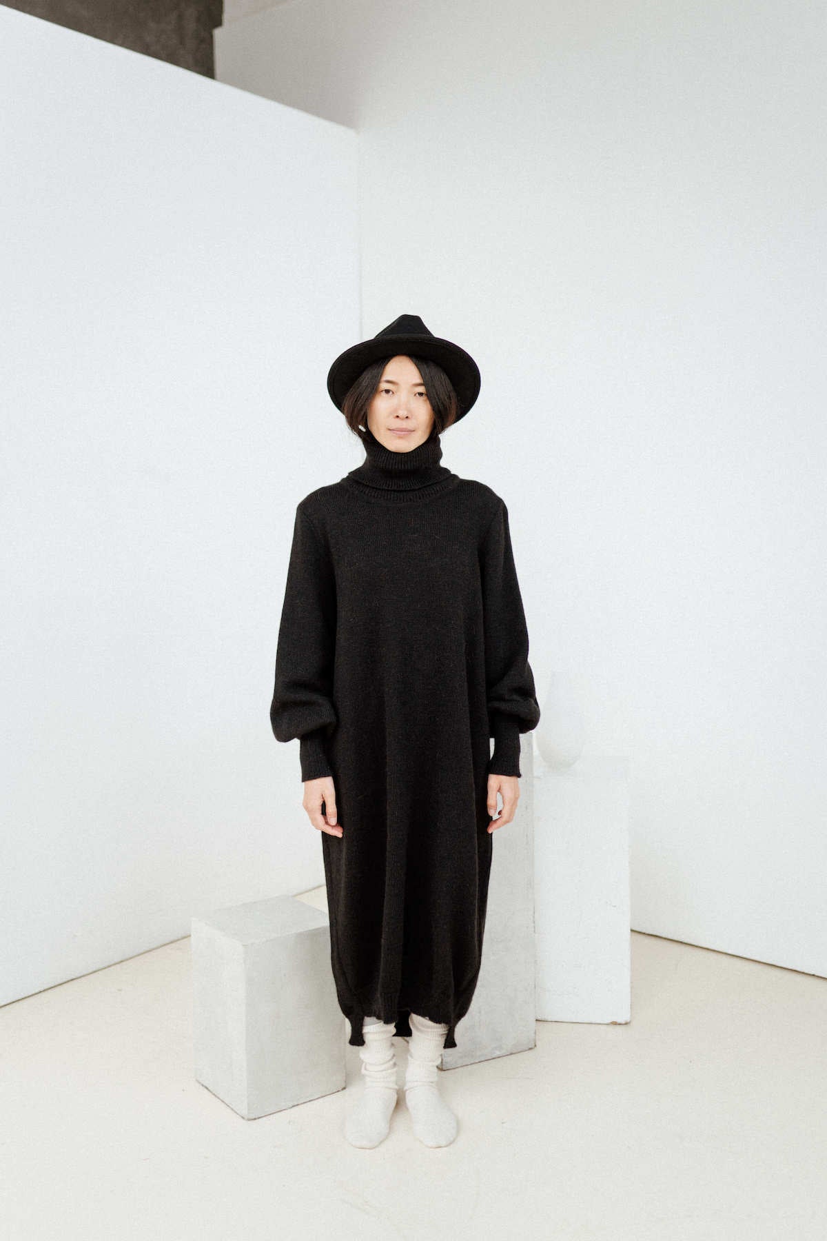 Black merino wool knitted dress with puffed sleeves HARUTO