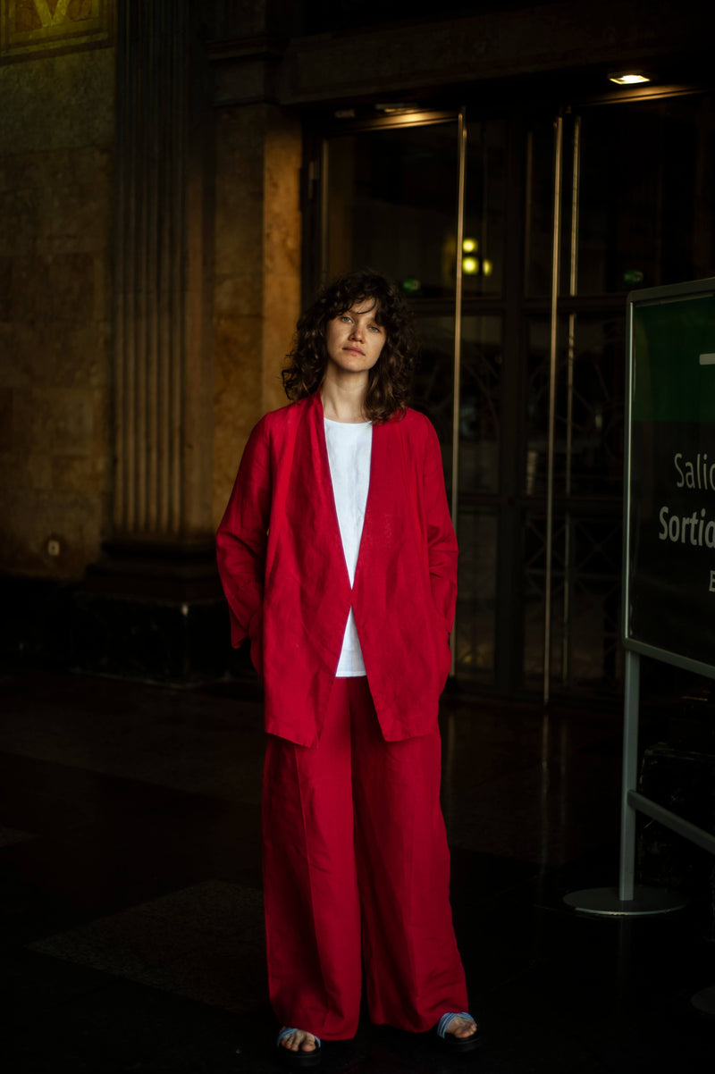 Minimalist red linen suit for women. Wide sleeve linen blazer and linen palazzo pants. Paired with a white linen T-shirt