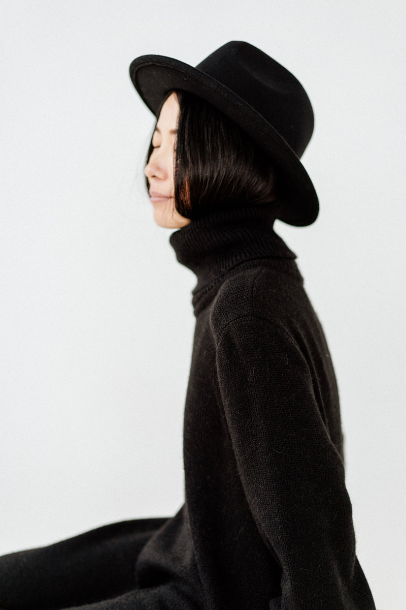 Black merino wool dress with a turtleneck