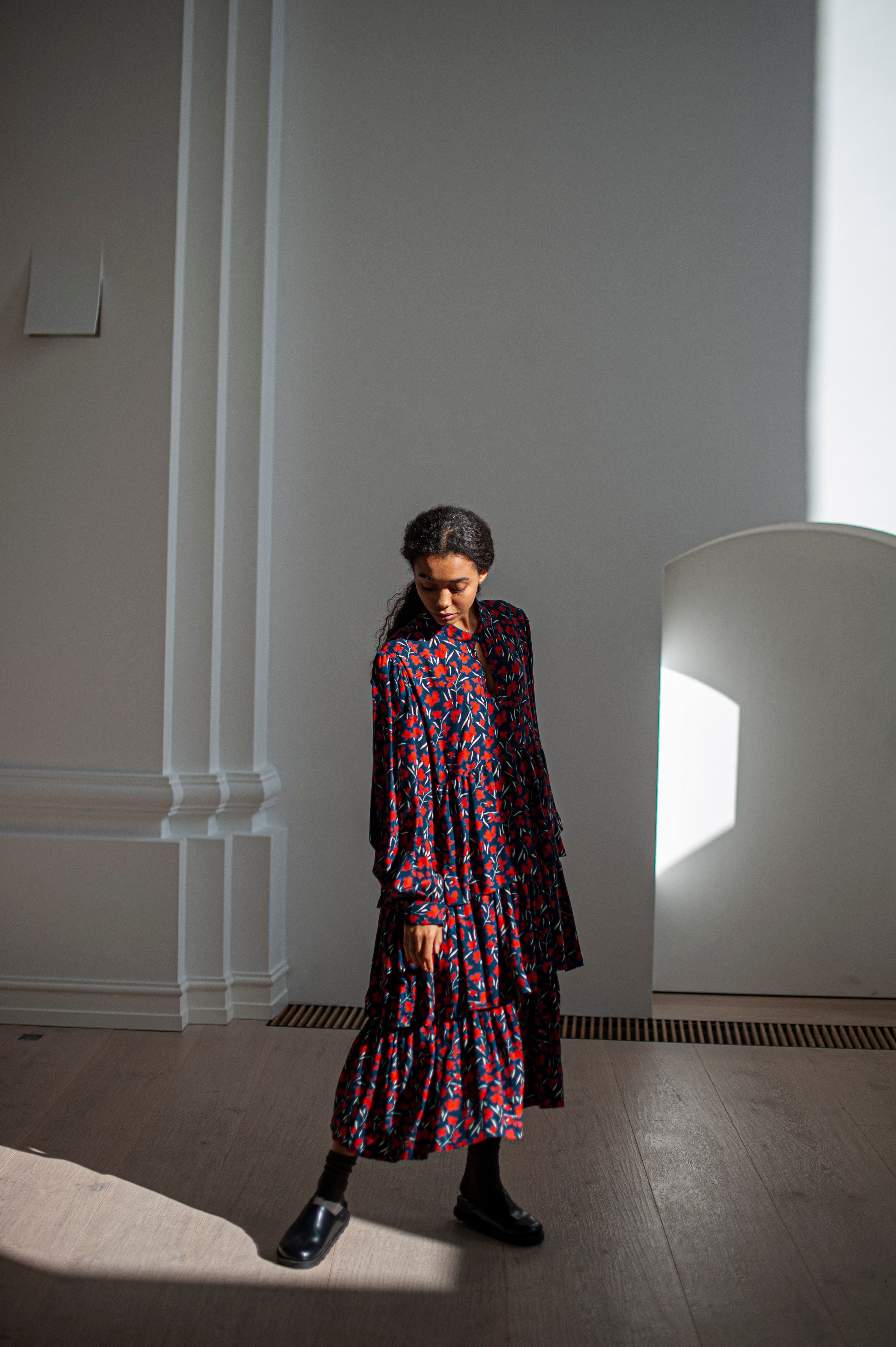 Floral print tiered dress with wide sleeves and a keyhole neckline