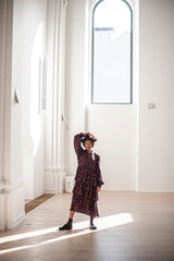 Floral print viscose and wool dress with a ruffle skirt and voluminous sleeves