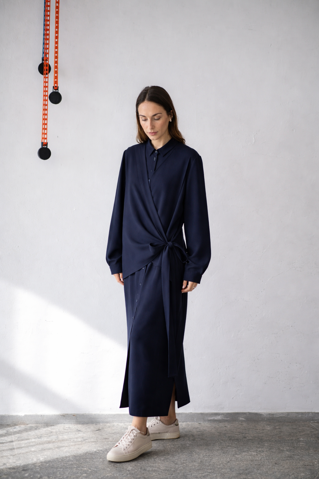 Long sleeve button-up wool dress with wrap vest detail
