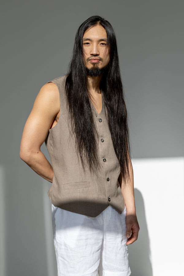 Minimalist beige linen vest for men. A classic and timeless wardrobe staple working for every day and special occasions