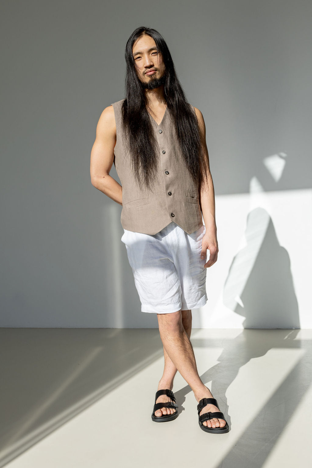 Men's linen shorts. Soft, breathable linen. Paired with a beige linen linen waistcoat. Men's linen outfit.