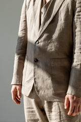Naturally wrinkled linen blazer atop a matching waistcoat