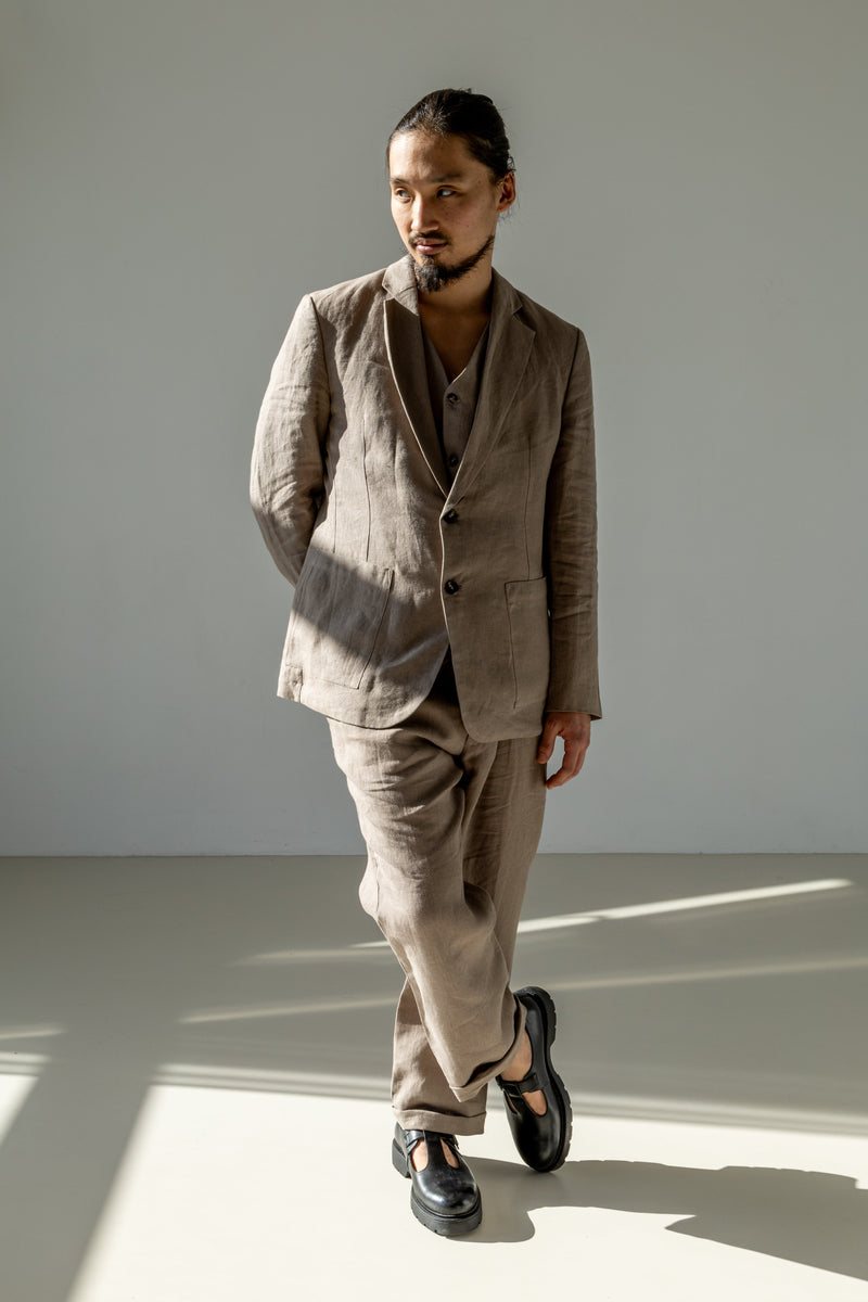 Men's linen pants in beige. Flat front, zipper closure. A timeless and stylish wardrobe staple that works for every day and every occasion.