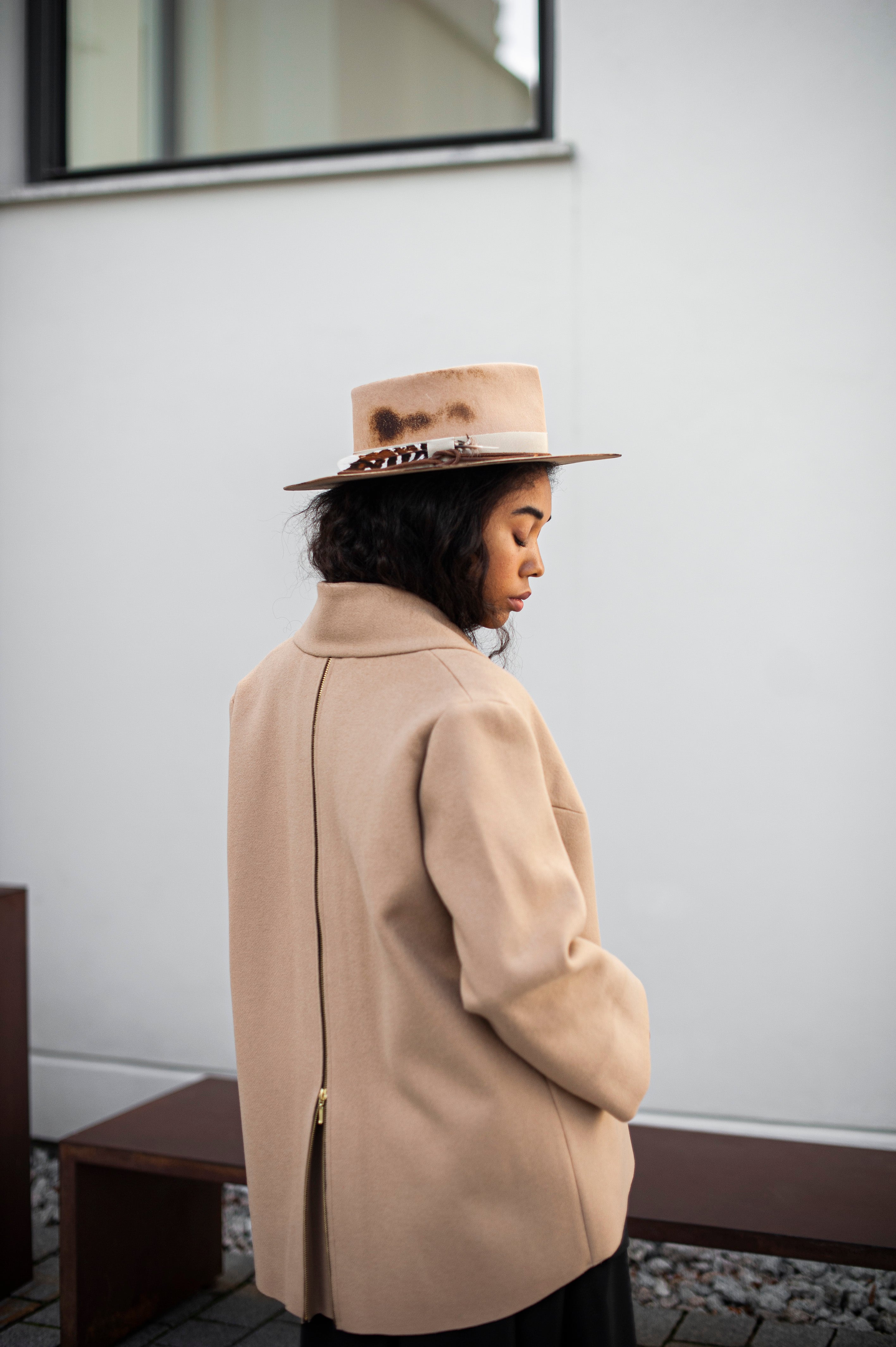 Beige wool blazer with a longer back and shorter open front