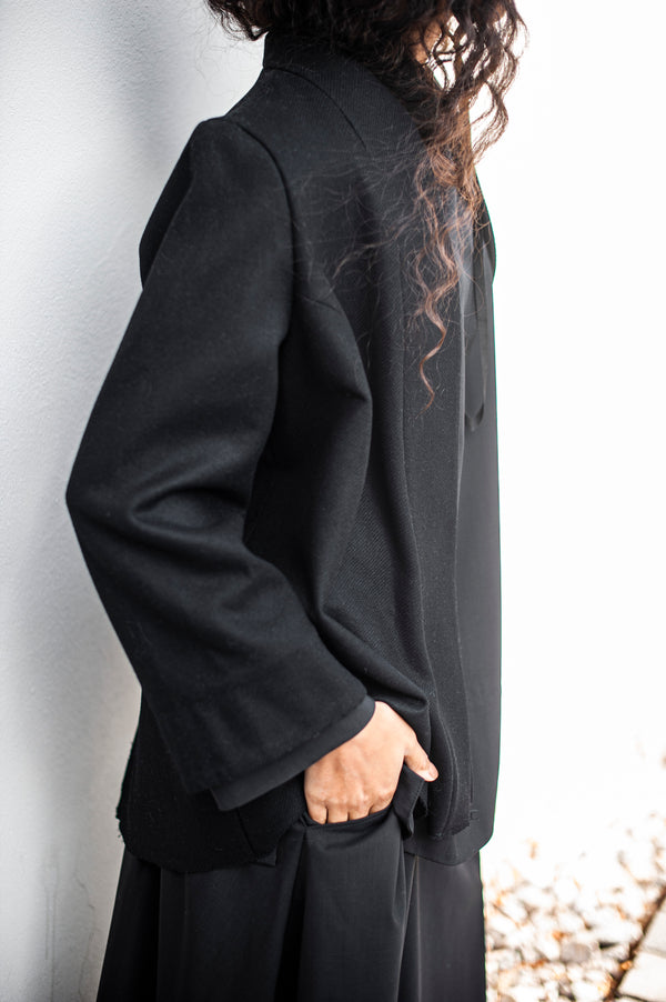 Women's relaxed silhouette wool blazer in an A-line silhouette and with wide sleeves