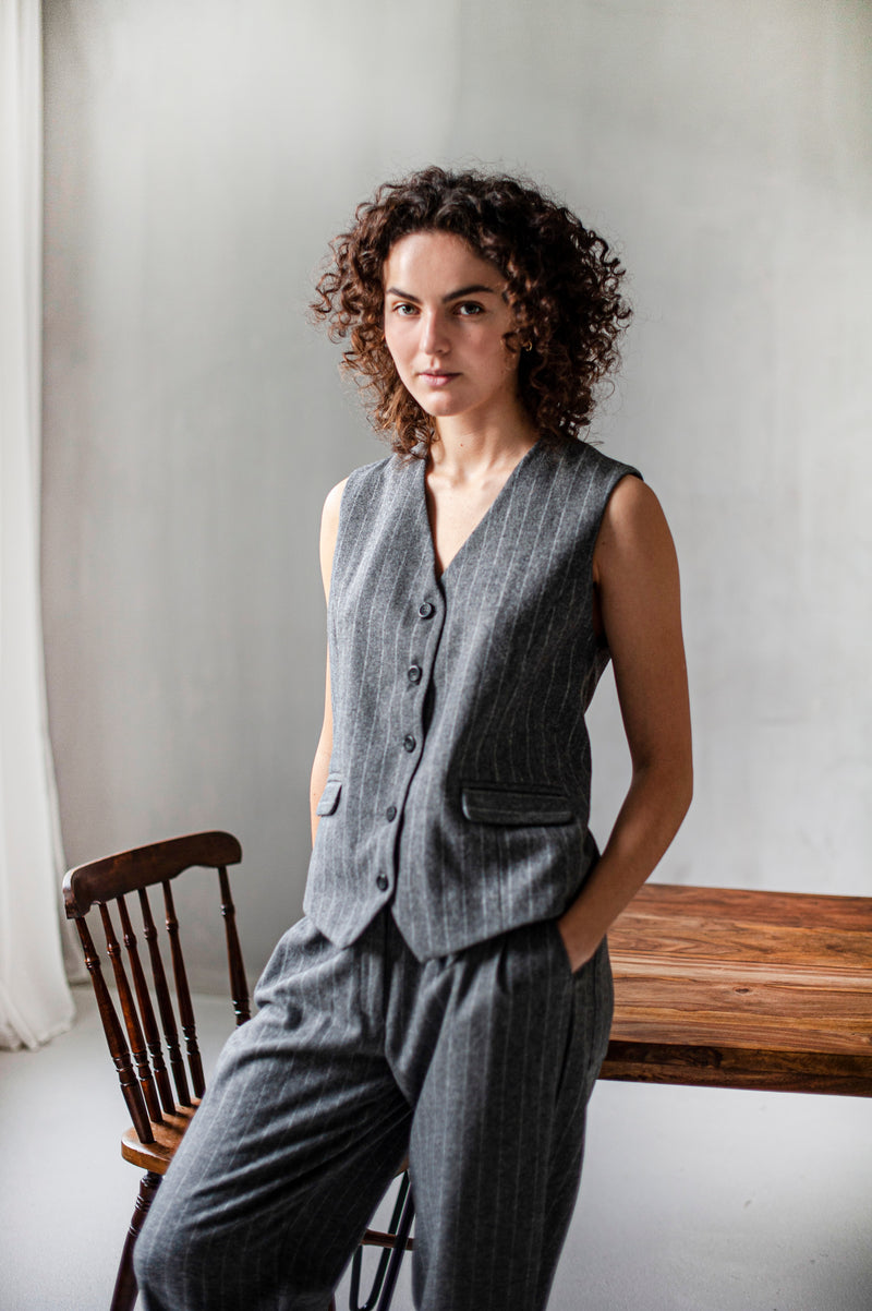 An ensemble of a classic vest and matching tapered-leg trousers 