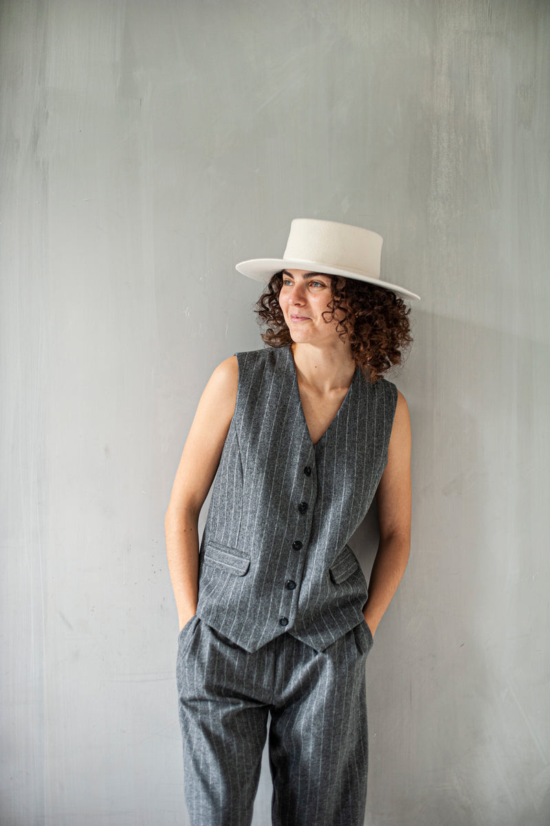 Women's wool vest paired with a matching pair of pleated trousers