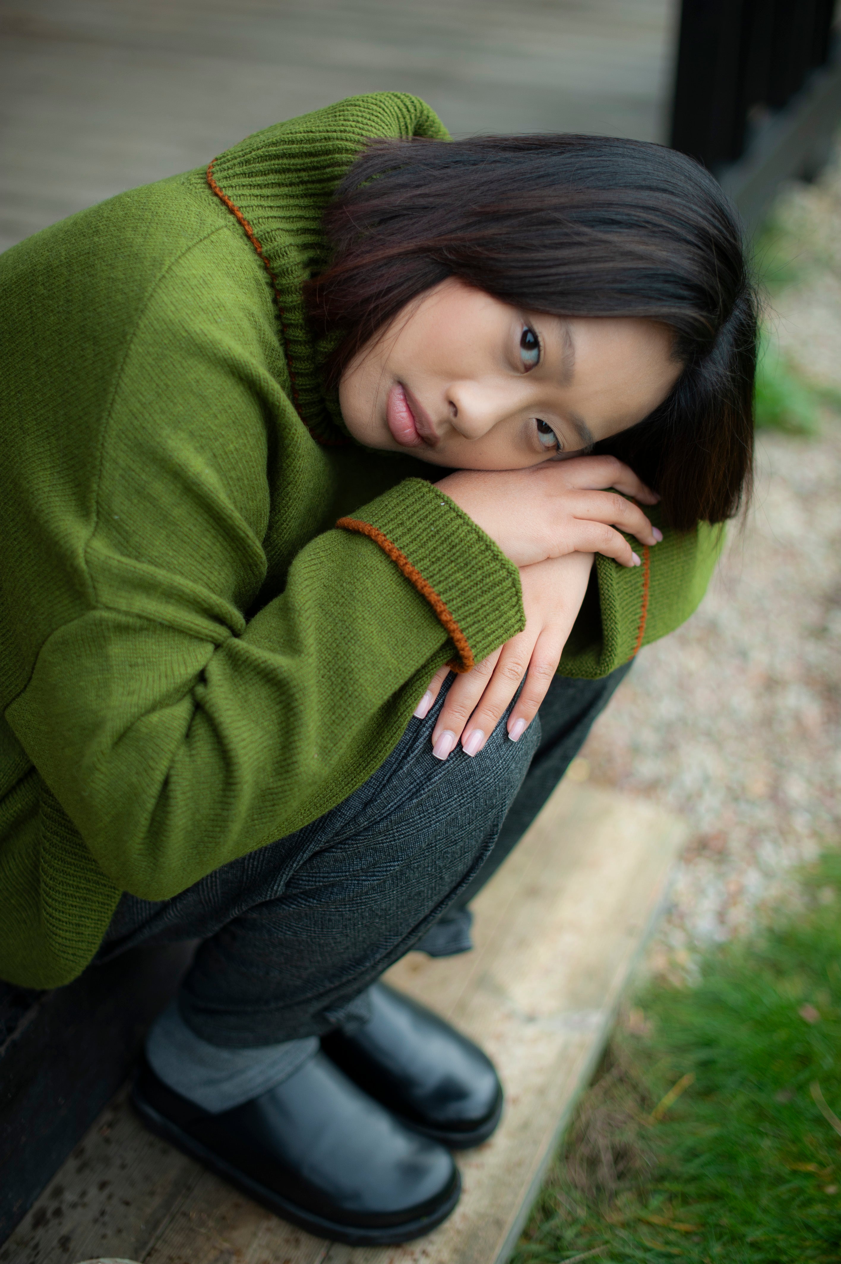 Minimalist merino wool sweater with a twist - contrastive stitch row on the cuffs and high-neck.