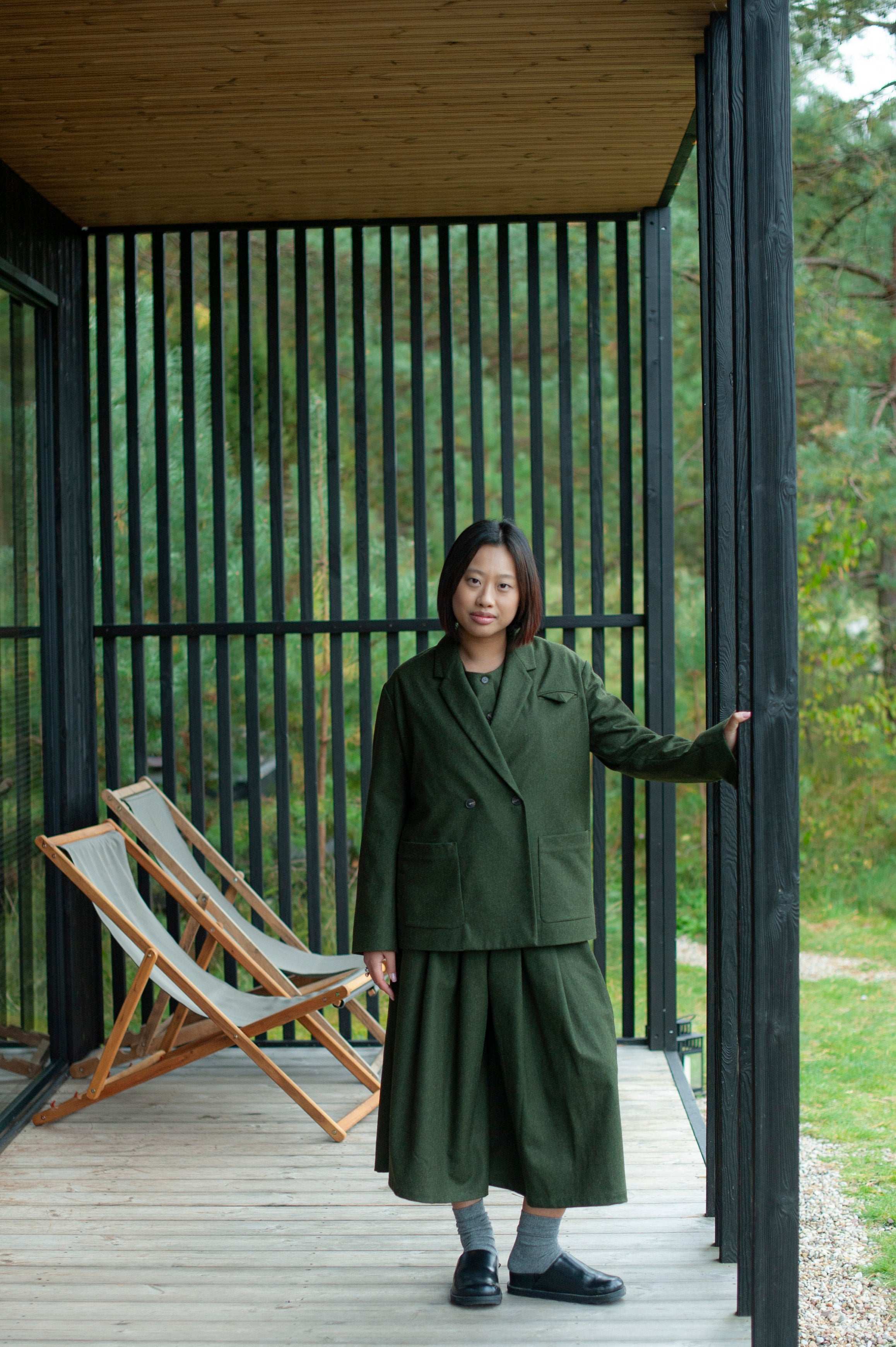 Mid-calf length culotte pants paired with a minimalist matching color double breasted blazer.