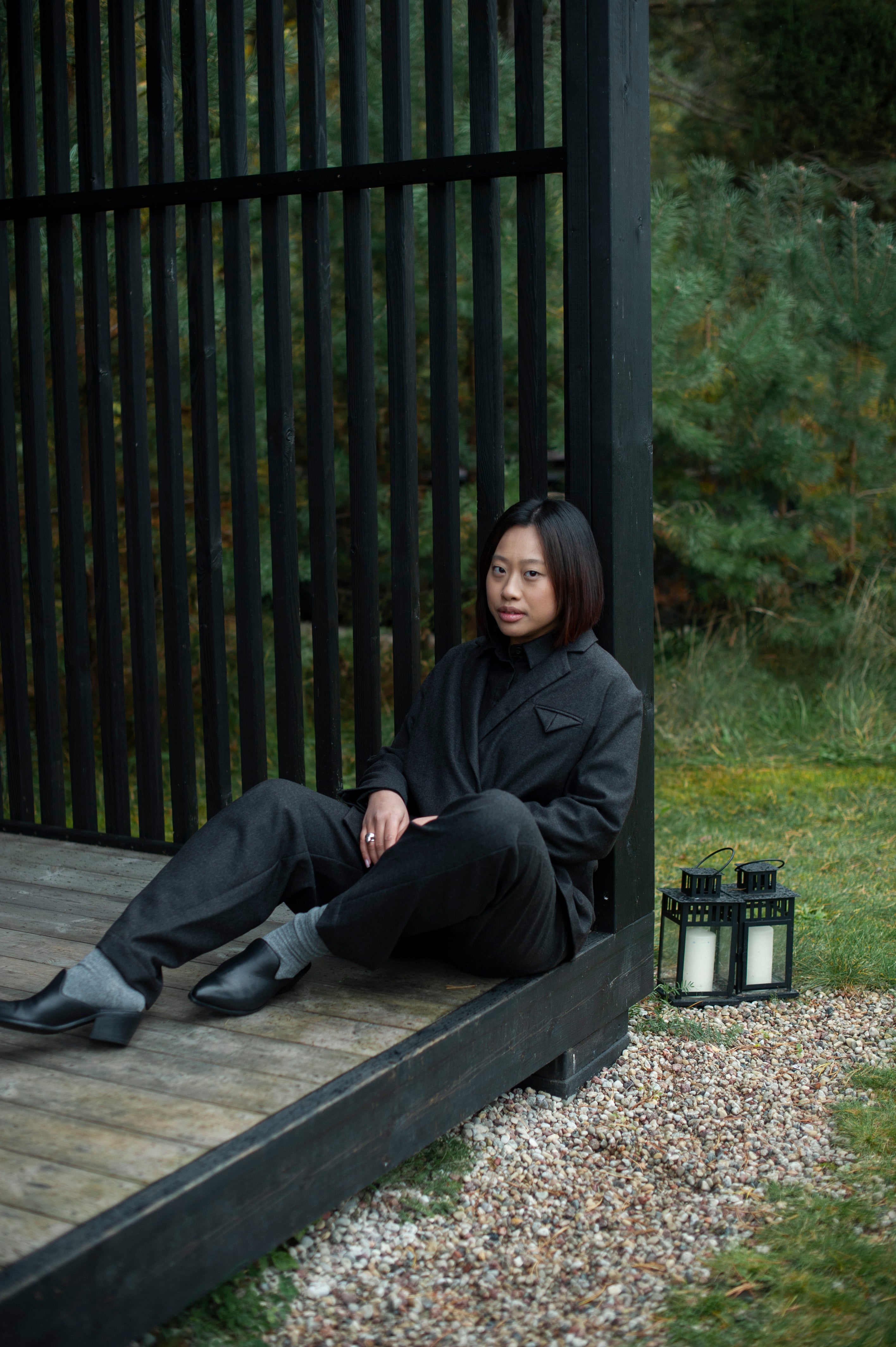 Brown wool blend straight leg trousers paired with an Oxford shirt and a boxy blazer.